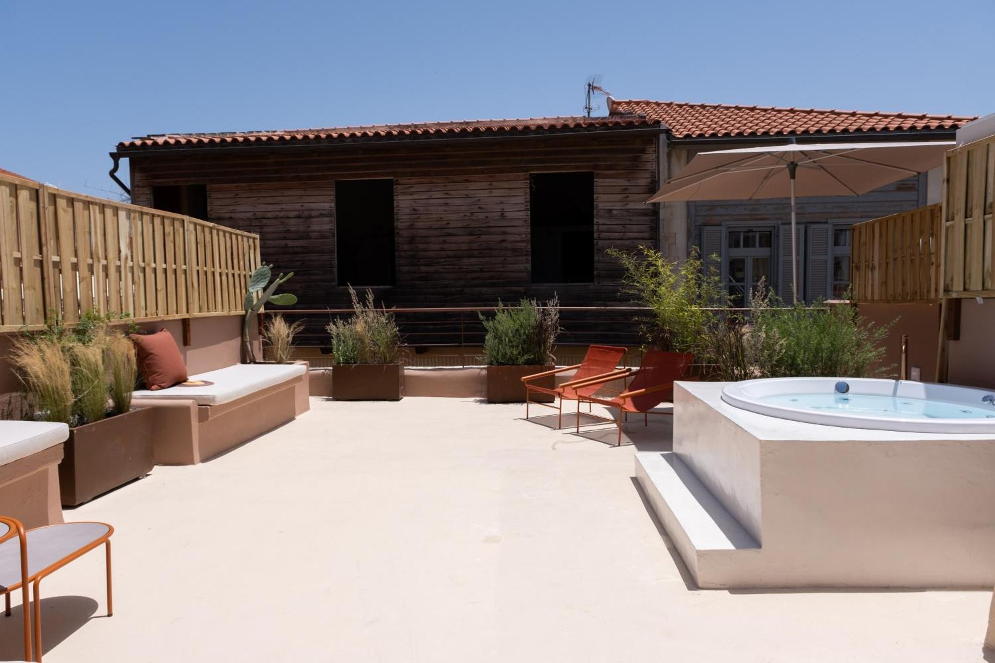 חאניה Qualia Slowlife Suites מראה חיצוני תמונה